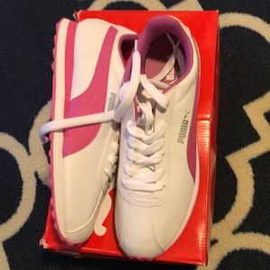 Pink and white pumas